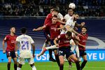 Players fight for the ball during a LaLiga&nbsp;football match between Real Madrid CF and CA Osasuna&nbsp;in Madrid on Oct.&nbsp;27, 2021.&nbsp;