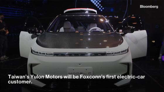 Apple’s iPhone Partner Foxconn Unveils First Electric Vehicles