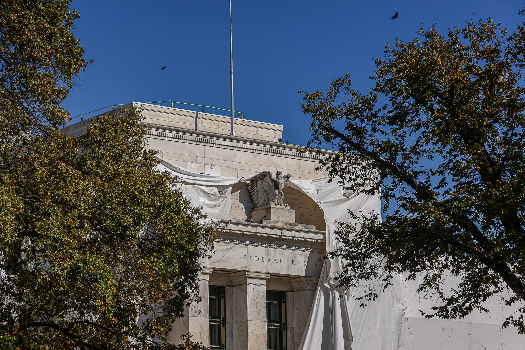 The Marriner S. Eccles Federal Reserve building during a renovation in Washington, DC, US, on Tuesday, Oct. 24, 2023. The Federal Reserve chair last week suggested the US central bank is inclined to hold interest rates steady again at its next meeting while leaving open the possibility of a future hike if policymakers see further signs of resilient economic growth.