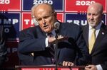 Rudy Giuliani speaks to the media at a press conference held in the back parking lot of Four Seasons Total Landscaping in Philadelphia, on Nov. 7.