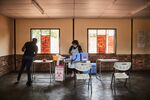 Heath workers prepare their vaccine administration area at a school in Mpumalanga, South Africa.