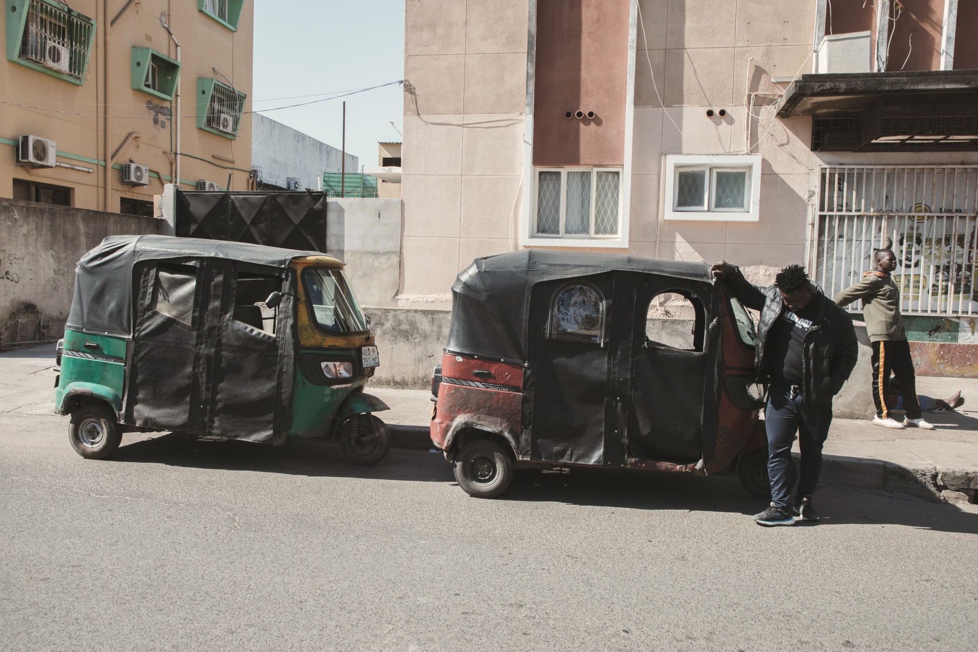 Three-wheeled taxis in Maputo.