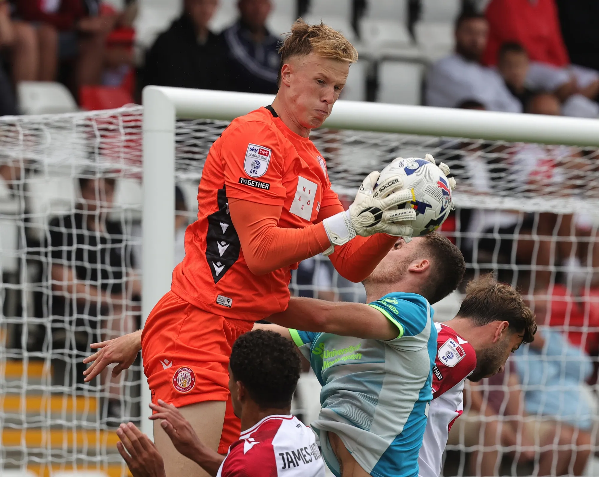 Fillip Marschall of Stevenage rises to collect the ball during the Sky Bet League One match between Stevenage and Northampton Town at The Lamex Stadium on August 16, 2025 in Stevenage, England.