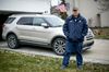 Bert Henriksen stands in front of his Ford Explorer outside his home
