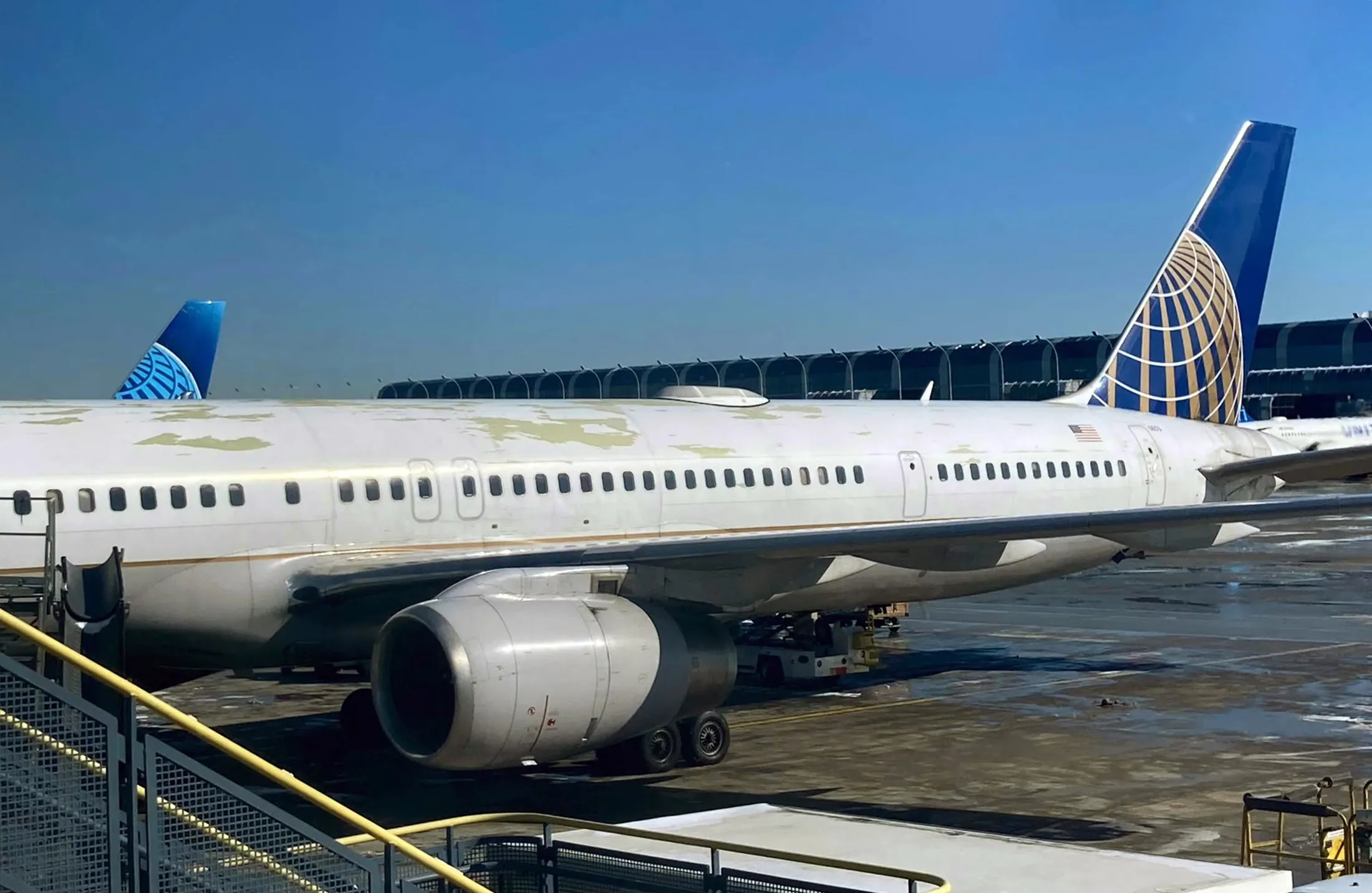 Peeling paint is seen on a Boeing 757-300 operated by United Airlines at O’Hare International Airport in Chicago, Illinois, on Feb. 18, 2022.
