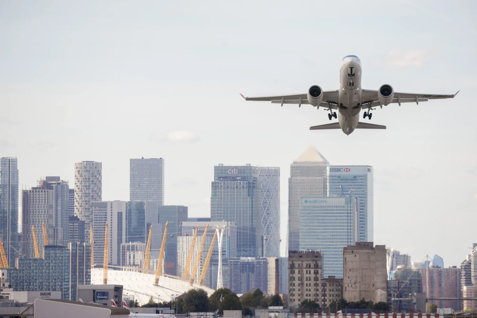 A passenger aircraft takes off from London City Airport.