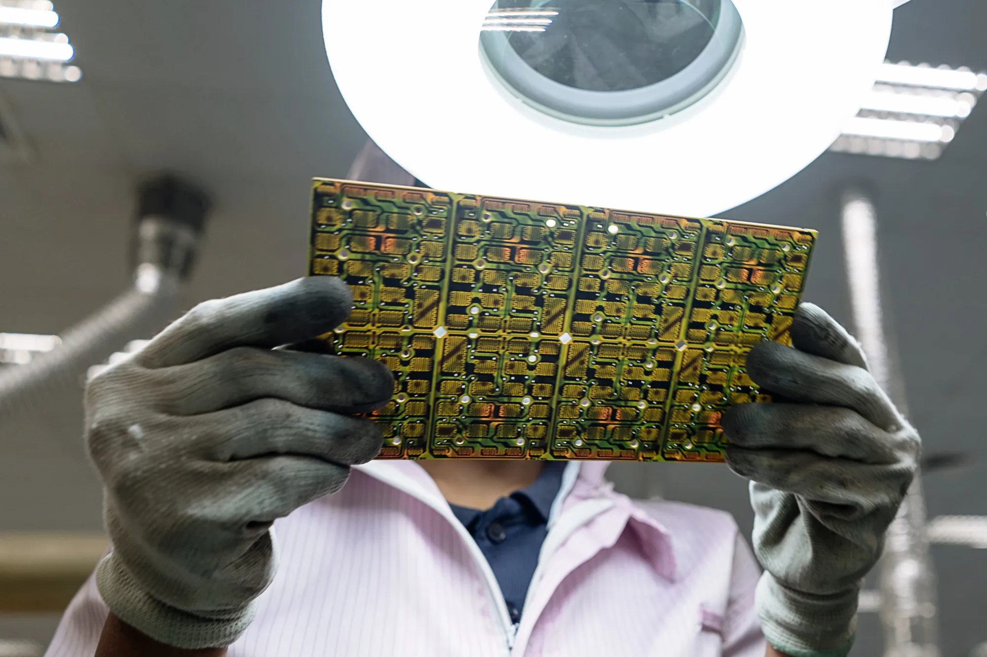 Manufacturing Calculators at a Cal-Comp Technology Factory as New Kinpo Group Philippine Unit Plans IPO 