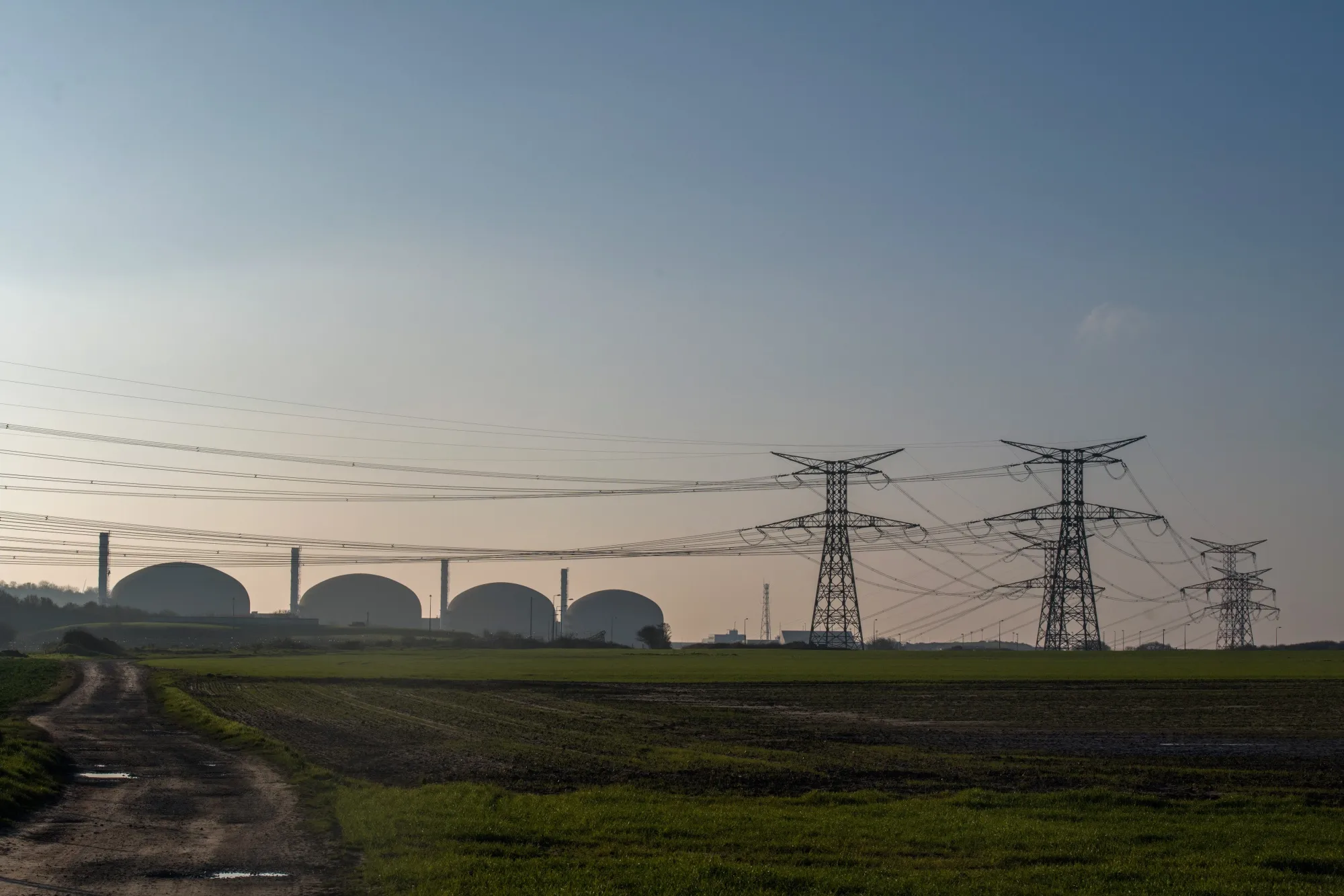 Electricity pylons and power lines near the Paluel nuclear power plant&nbsp;in Paluel, Normandy, France.
