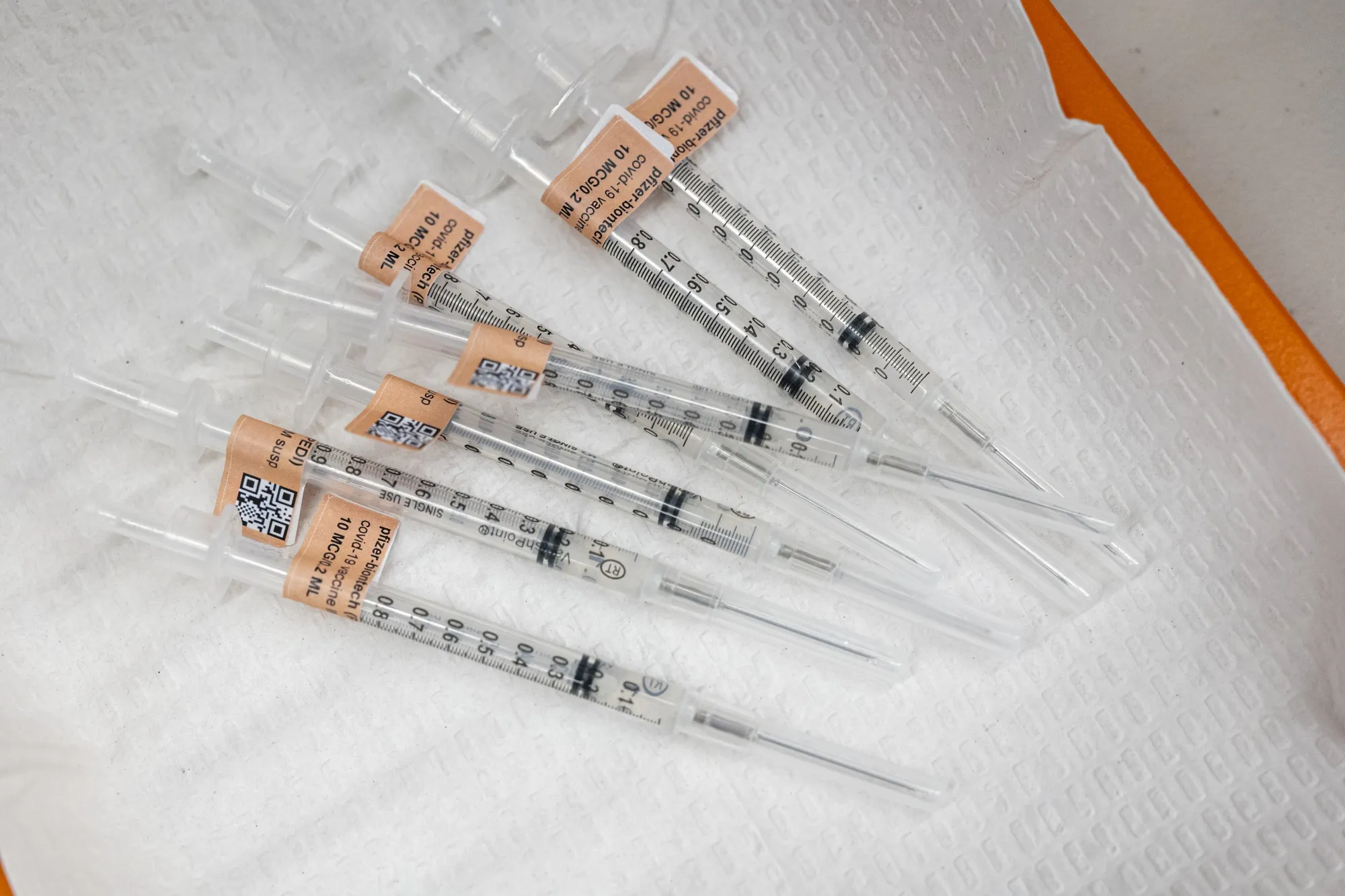 Prepared syringes with a dose of the Pfizer-BioNTech Covid-19 vaccine.