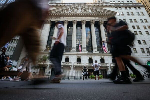 Traders At The NYSE As Stocks Hold Near Record Before Key Inflation Data