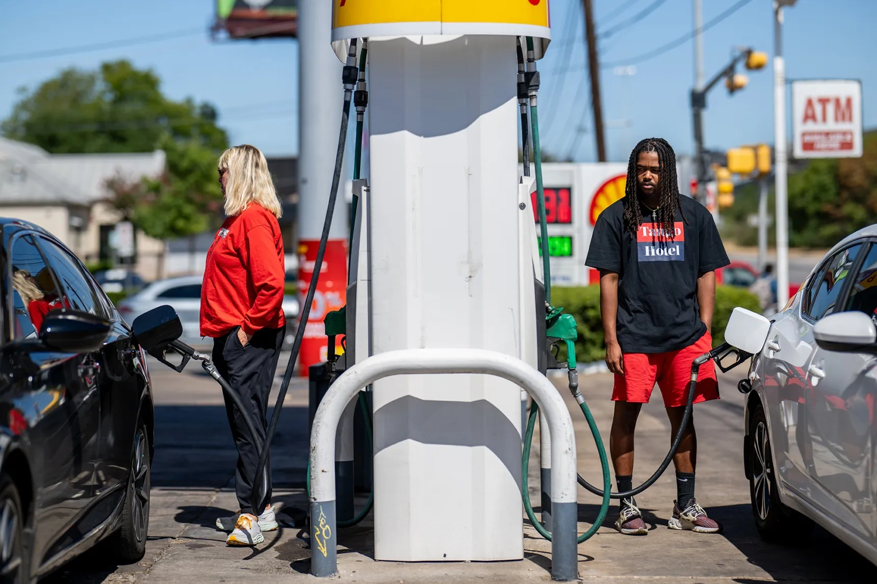 People pump gas in Austin, Texas.&nbsp;