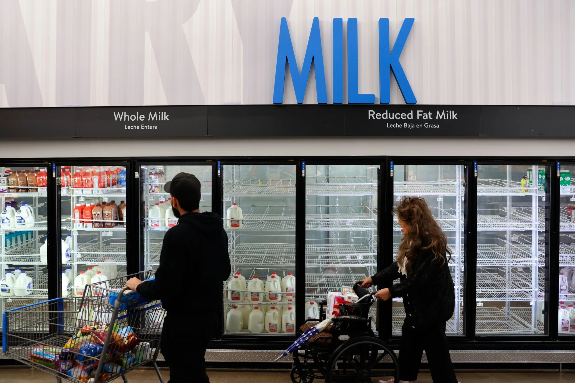Empty shelves for milk at a store ahead of a winter storm in Dallas, Texas, on Friday.
