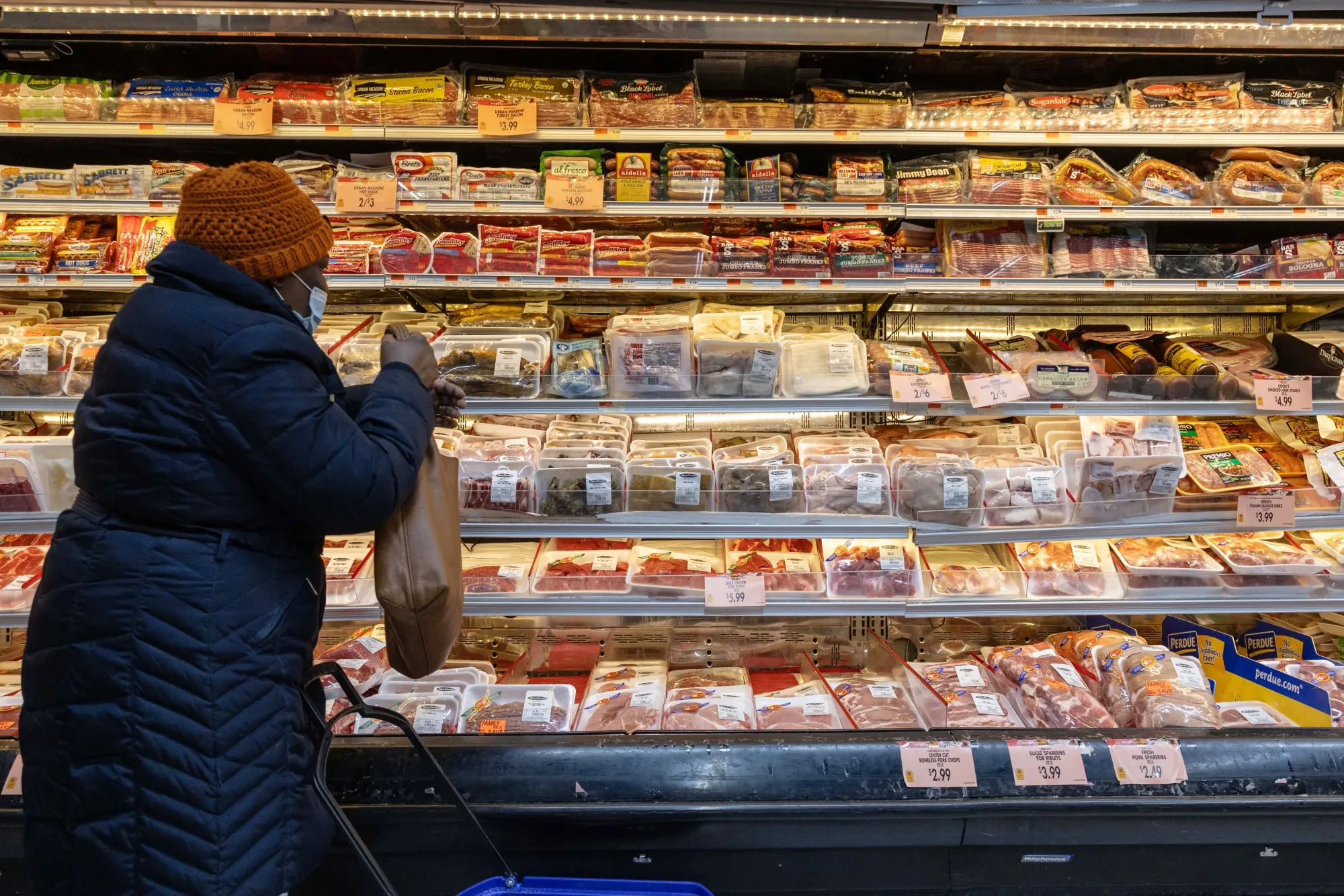 A shopper at a grocery store in New York.
