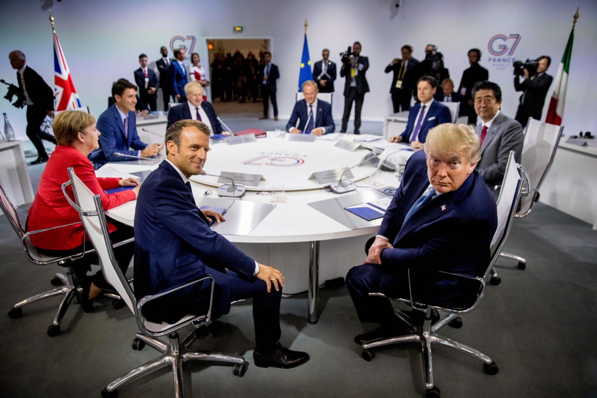 Emmanuel Macron , Donald Trump and other G7 leaders during the G7 summit&nbsp;in 2019.