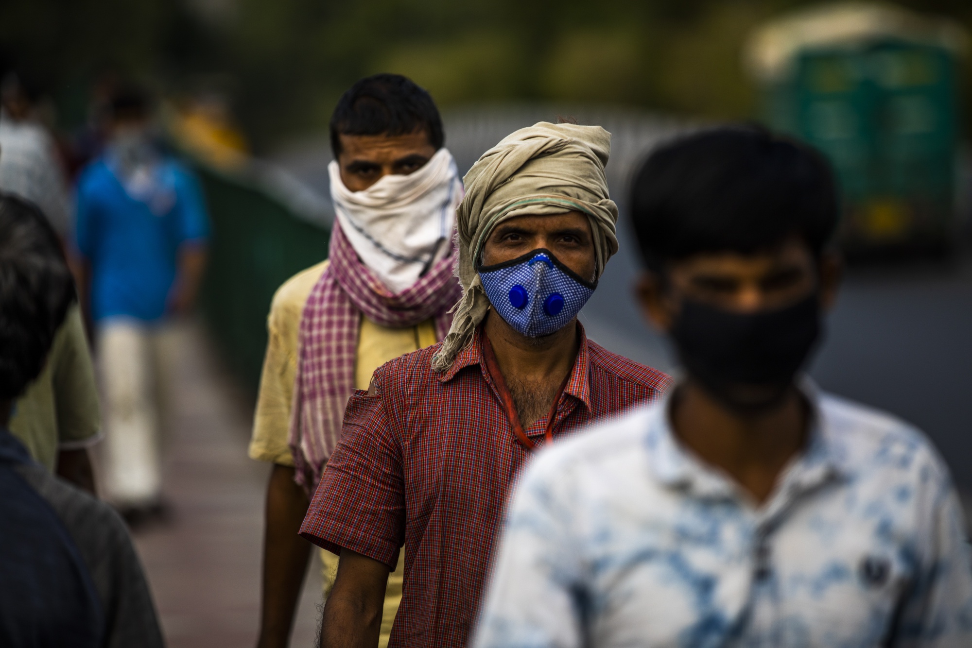 People wear face masks during a partial lockdown in New Delhi, India, on May 14.