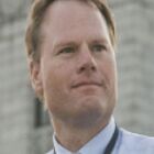 Headshot of John P Burke