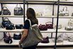 Joana Portugal, visiting New York from Brazil, looks over a