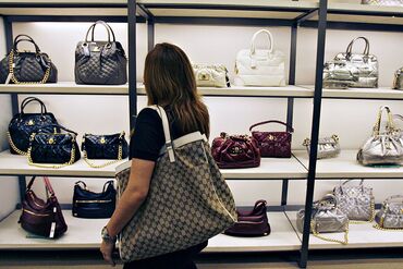 Joana Portugal, visiting New York from Brazil, looks over a