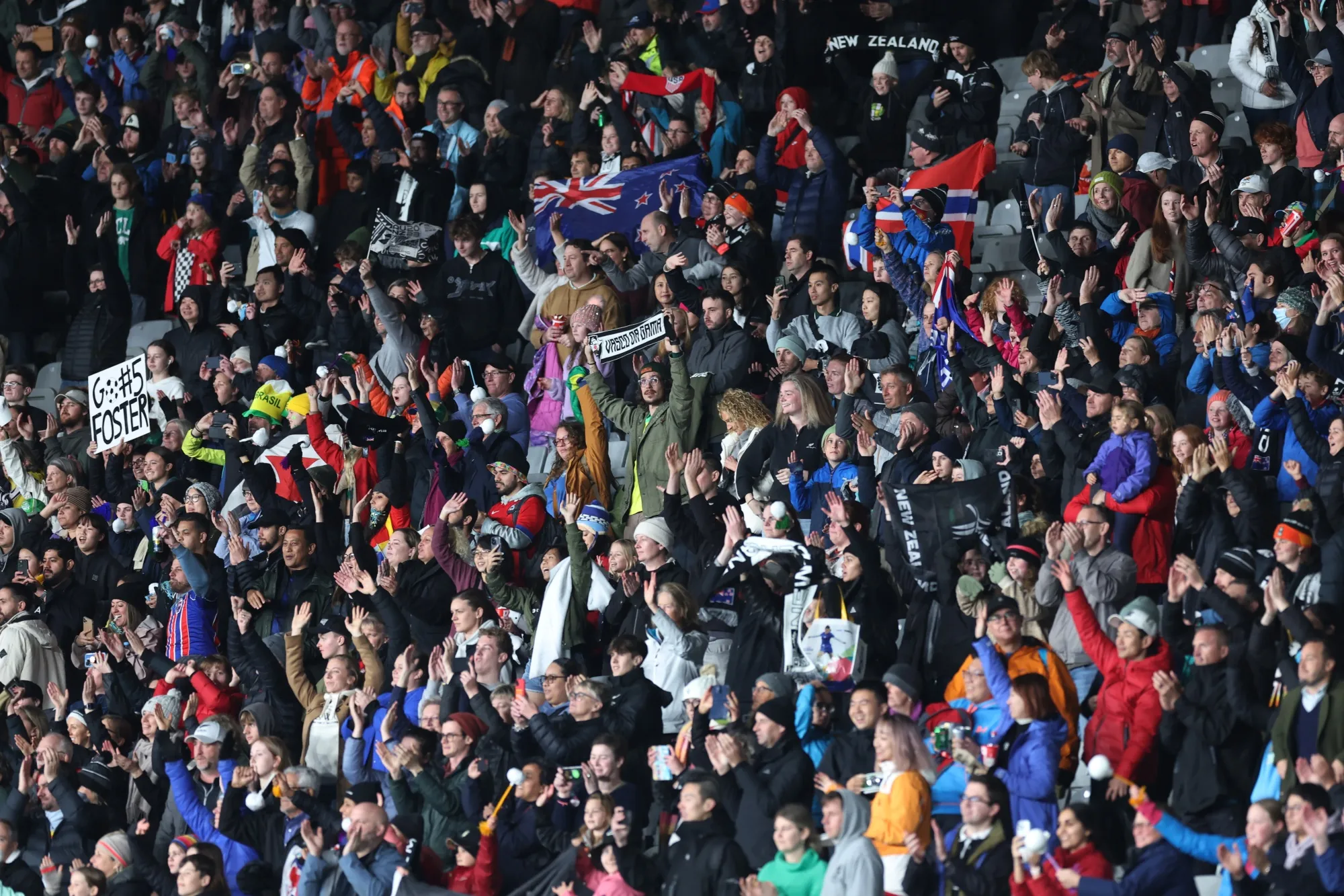 New Zealand fans celebrate winning their FIFA Women's World Cup match against Norway.