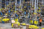 Workers sort products at the MercadoLibre fulfillment center on Black Friday in Sao Paulo, Brazil, on Friday, Nov. 26, 2021.&nbsp;
