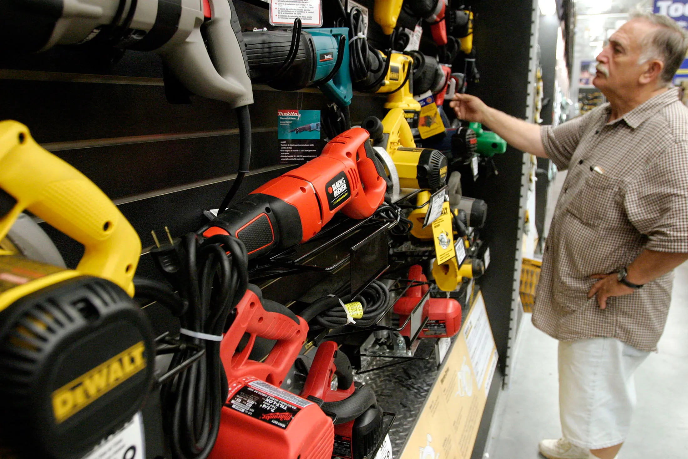 Customers shop for power-tools at Lowe’s Home Improvement Center on July 19, 2004 in Brooklyn, NY. Shares of Black &amp; Decker Corp., the largest U.S. power-tool maker, had their biggest gain in more than two decades after second-quarter earnings surged 61 percent on the fastest sales growth since at least 1991. Black &amp; Decker Corp. also owns DeWALT, Delta, and Porter-Cable power-tools.
