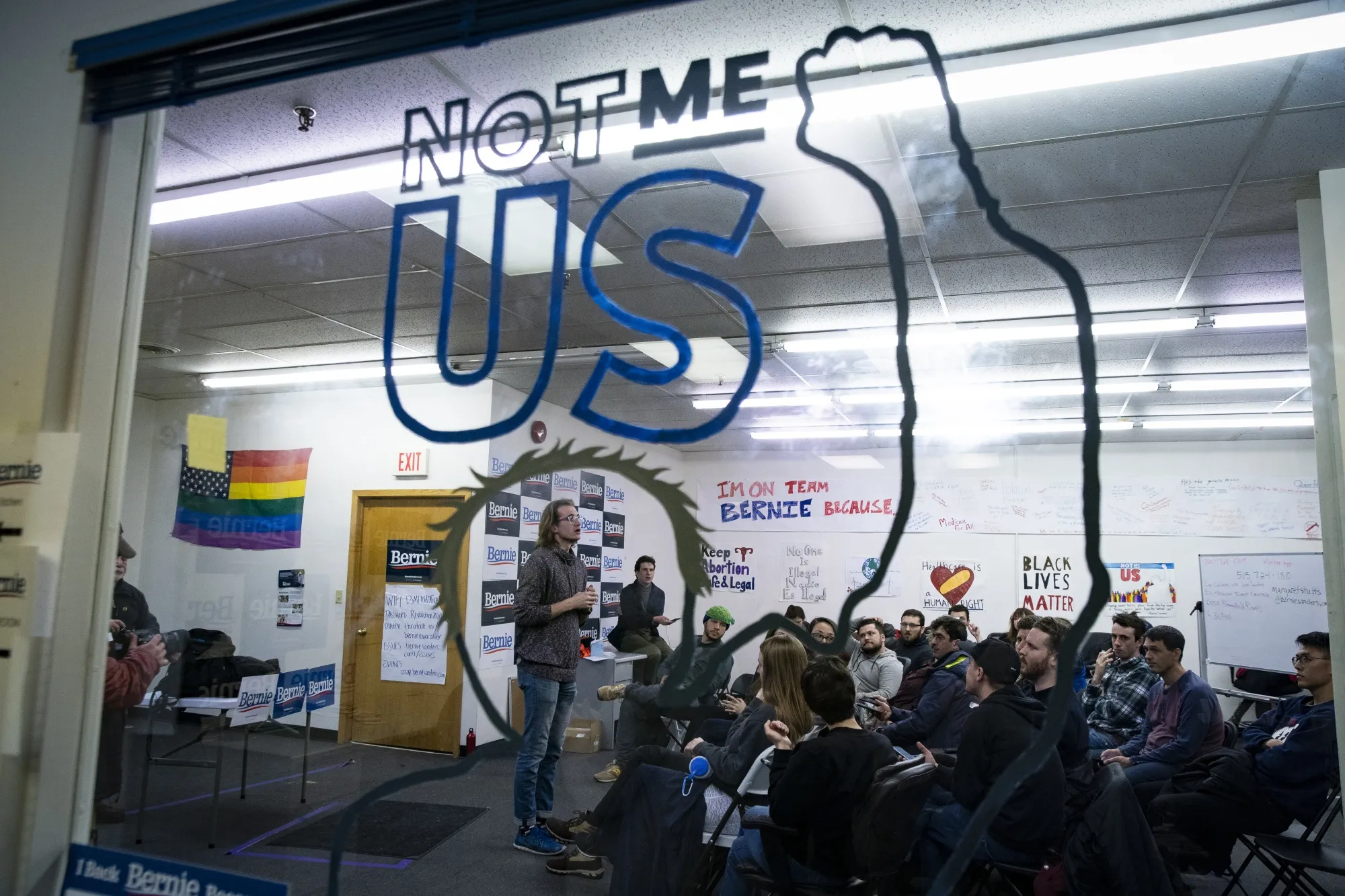 A volunteer speaks to attendees during a canvass training at a field office for Senator Bernie Sanders in Des Moines, Iowa, on Jan. 31.