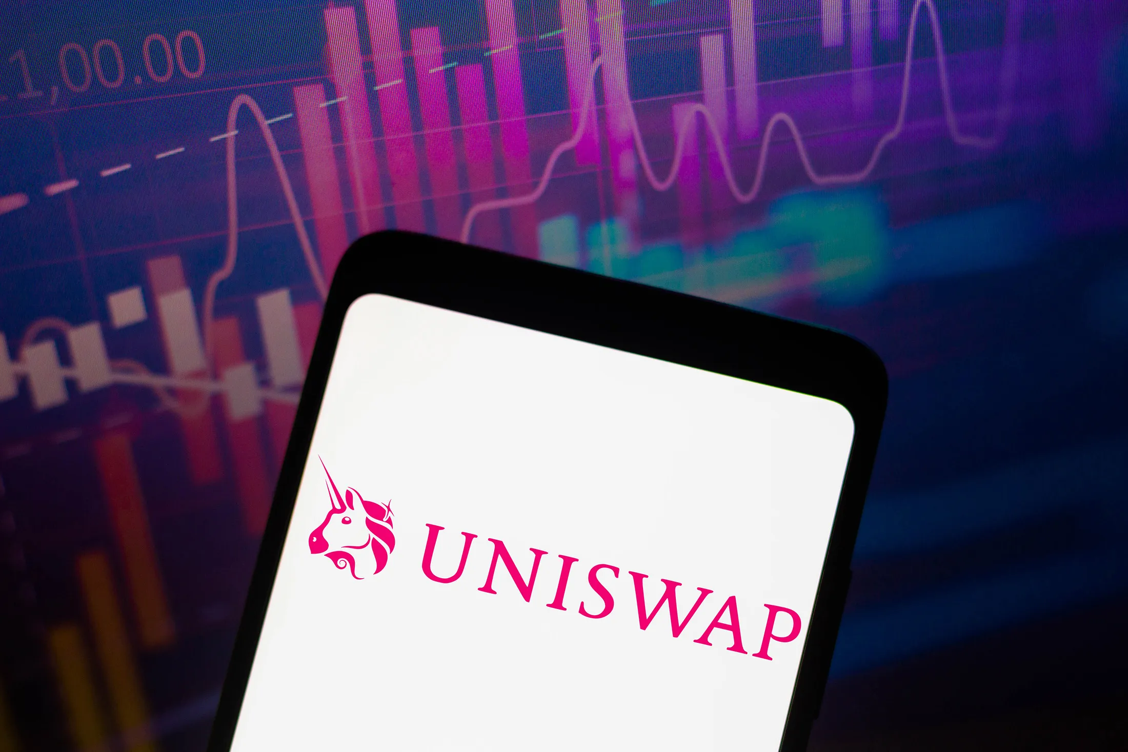 In this photo illustration, the logo of the Uniswap, a