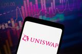 In this photo illustration, the logo of the Uniswap, a