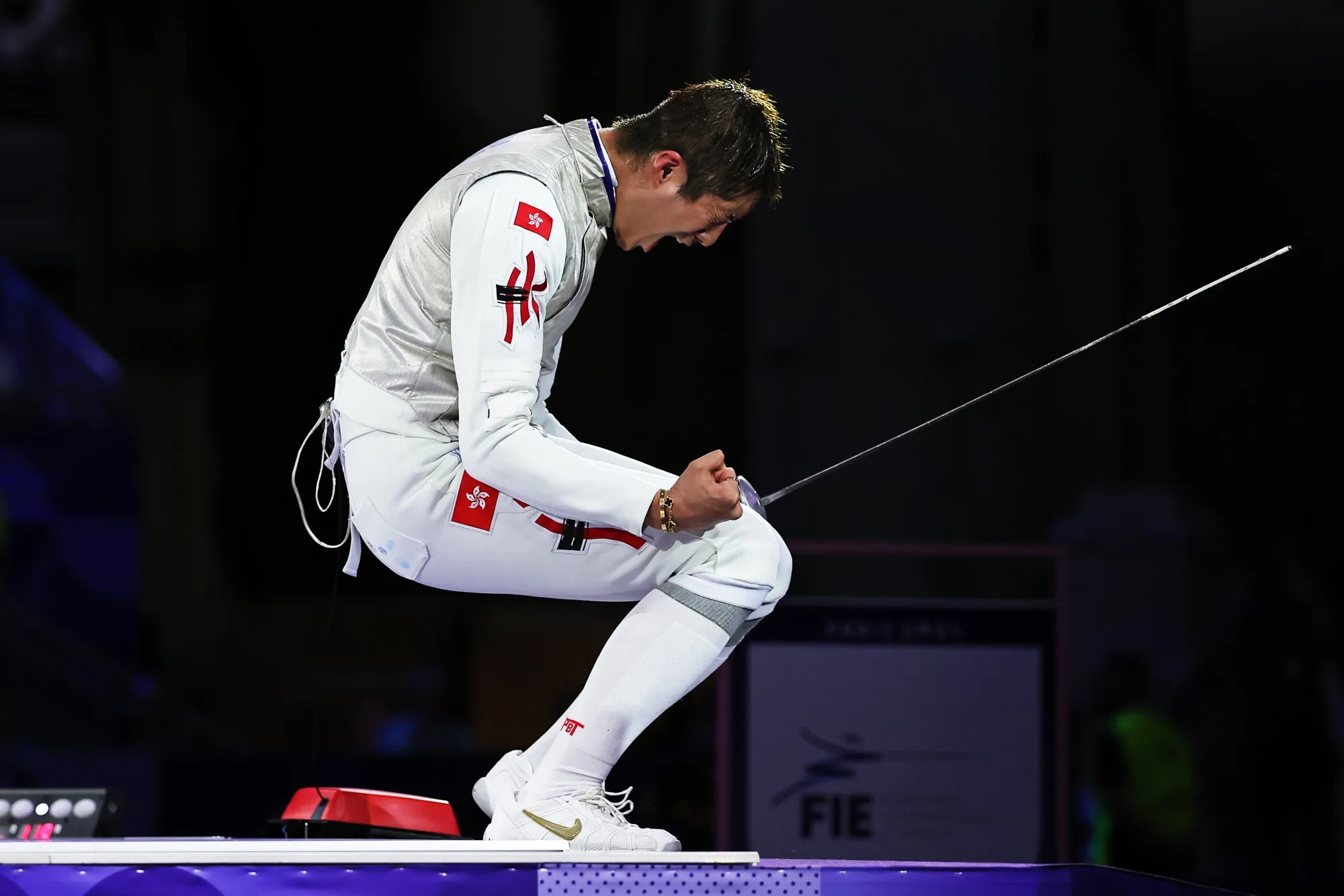 Edgar Cheung celebrates winning the Fencing Men's Foil Individual Gold Medal Bout on on July 29.