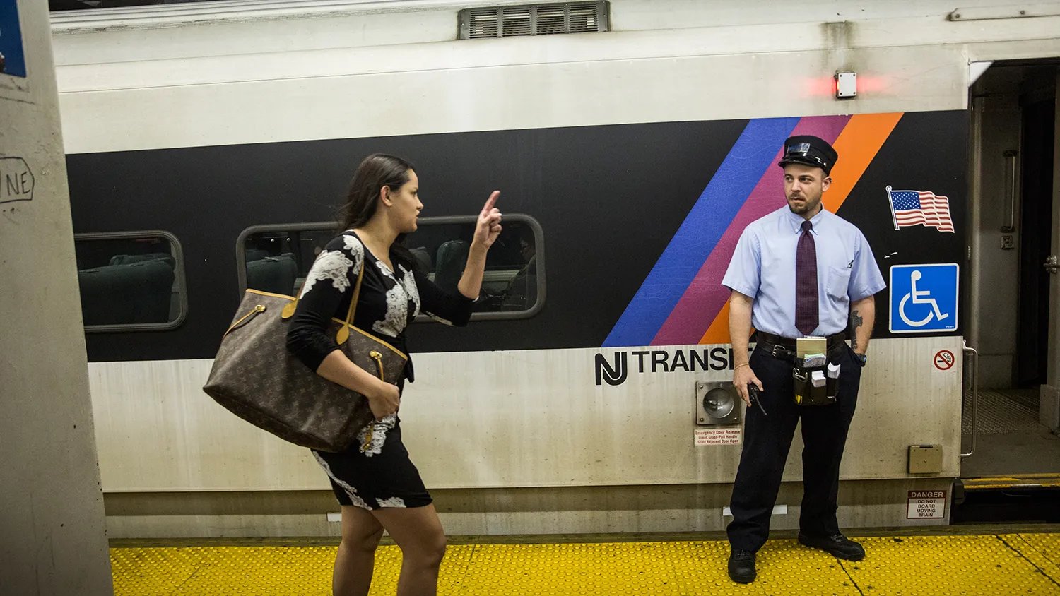 A woman rushes to catch the NJ Transit train from New York Penn Station to Trenton, NJ on May 13, 2015 in New York City.
