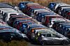 Nissan Motor Co. vehicles bound for shipment sit at the Nissan Oppama wharf in Yokosuka, Kanagawa Prefecture, Japan, on Tuesday, Jan. 22, 2019. Renault chairman and chief executive officer Carlos Ghosn is said to be ready to resign more than two months after his arrest in Japan for alleged financial crimes stunned the world's biggest car-making alliance. Already ousted as chairman of partners Nissan and Mitsubishi Motors Corp., Ghosn has kept his posts at Renault and as the head of the alliance between the automakers.
