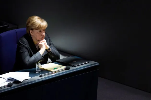 Chancellor Merkel listening to debate about the Ukrainian crisis at the Bundestag in Berlin