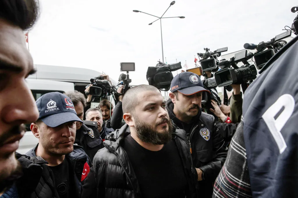 Faruk Fatih Ozer is brought to Istanbul Airport on April 20.