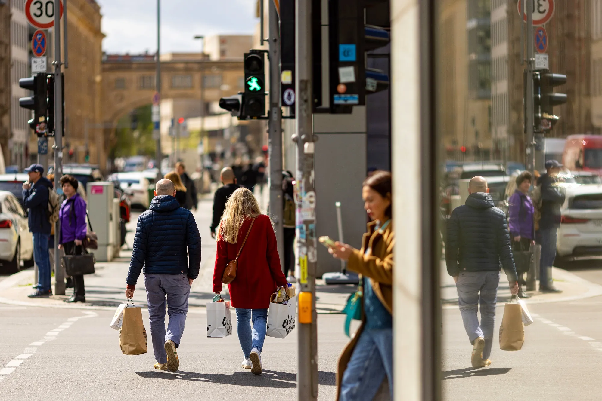 Shoppers walk along Friedrichstarsse in Berlin.