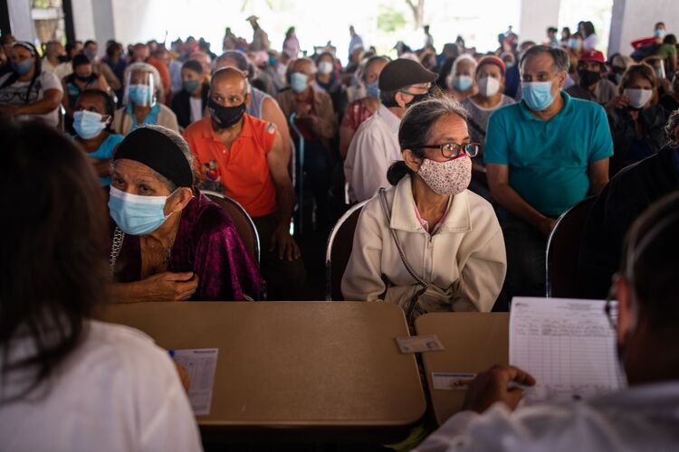 Venezuelans Wait In Line For Hours To Receive Covid-19 Vaccine