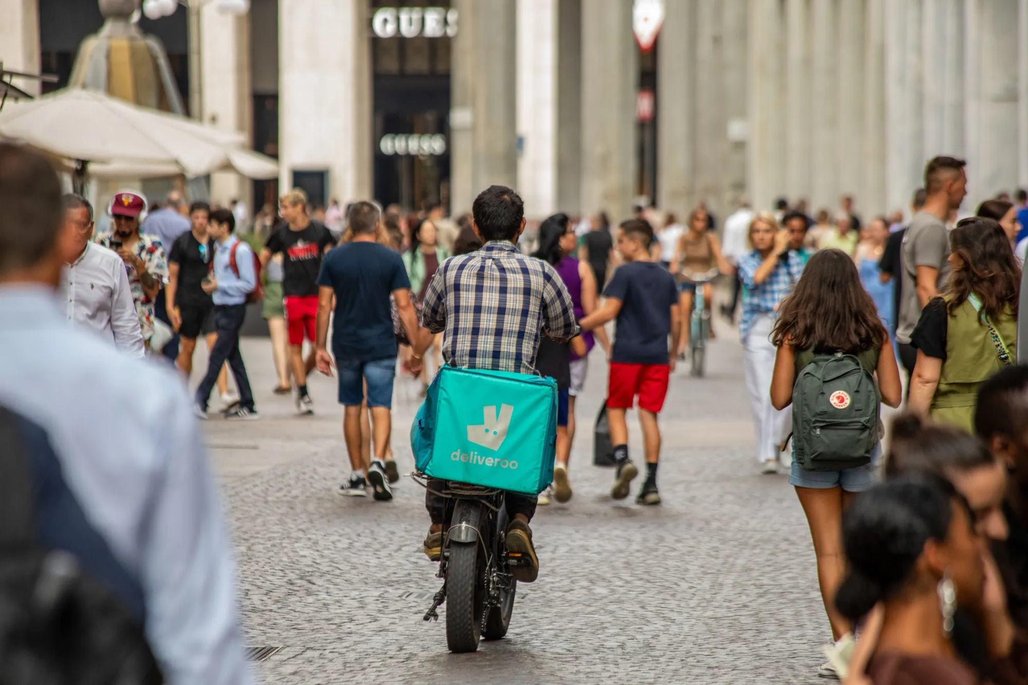 A food delivery courier, working for Deliveroo,&nbsp;in&nbsp;Milan, Italy.