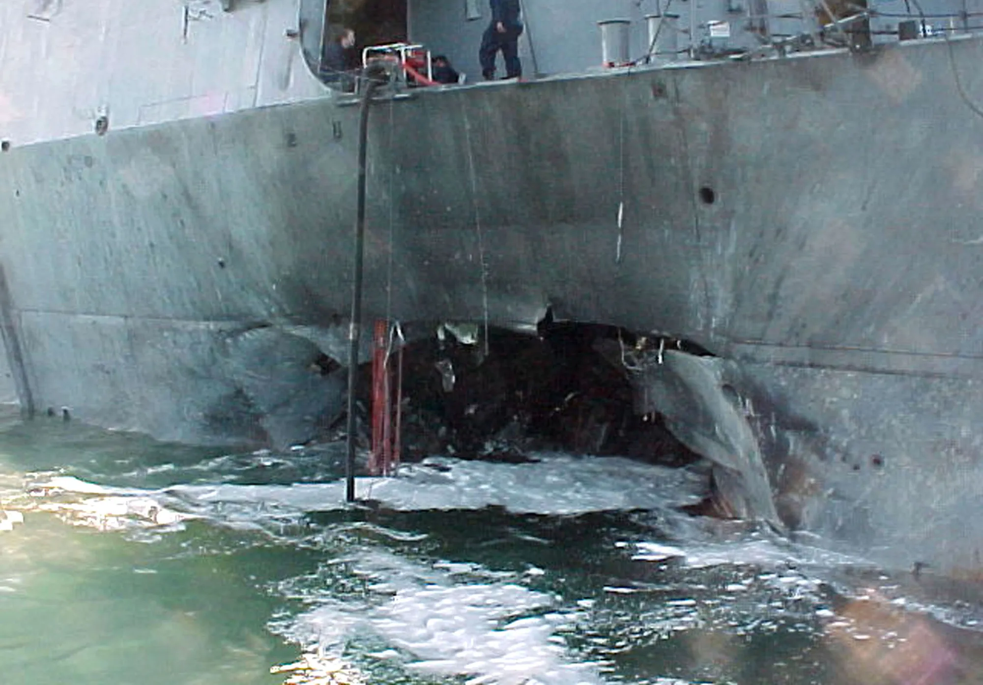 Port side view showing&nbsp;damage sustained by the&nbsp;USS Cole in Yemen on&nbsp;Oct.&nbsp;12, 2000.