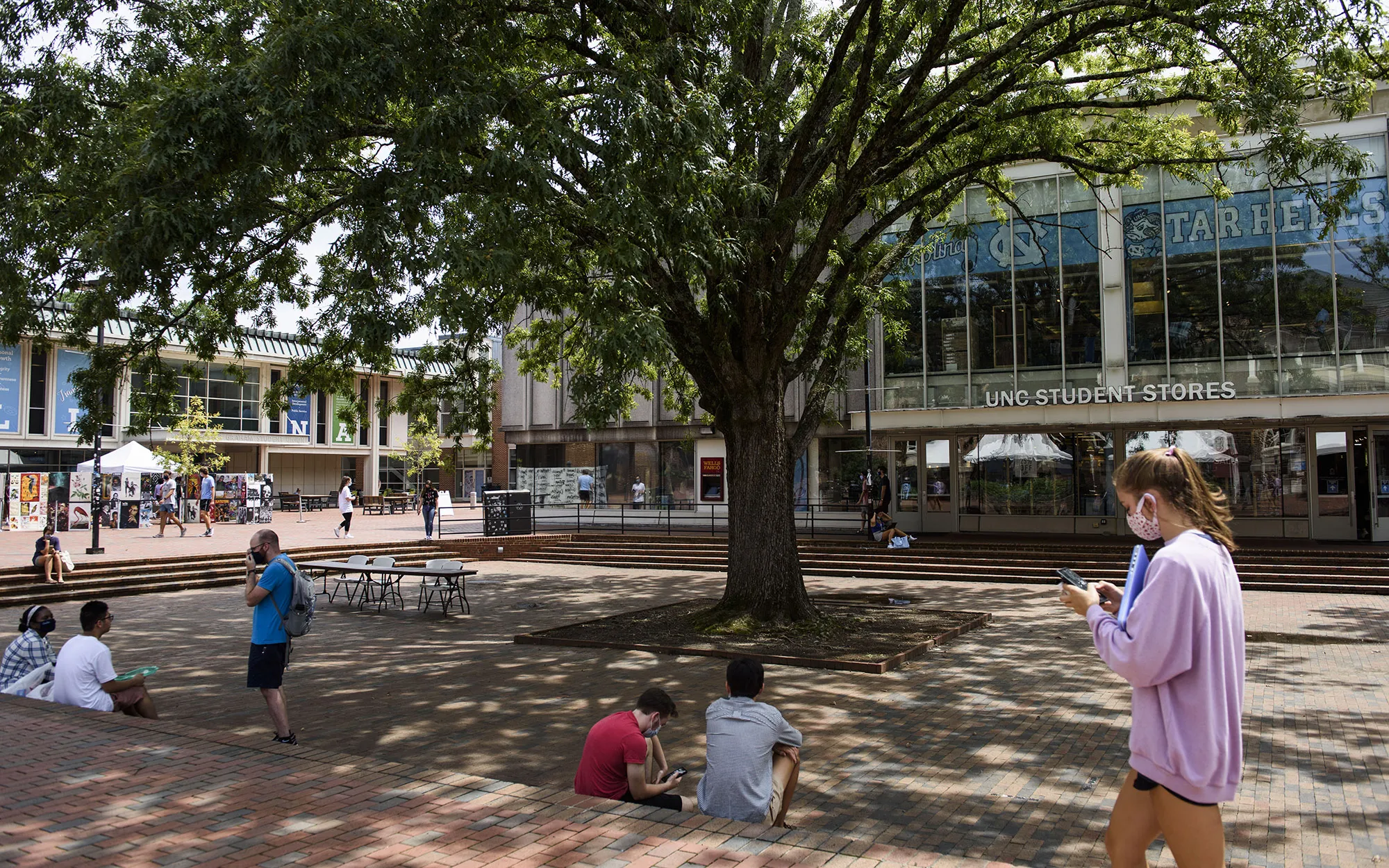 Students walk through the campus of the University of North Carolina at Chapel Hill on Aug. 18.