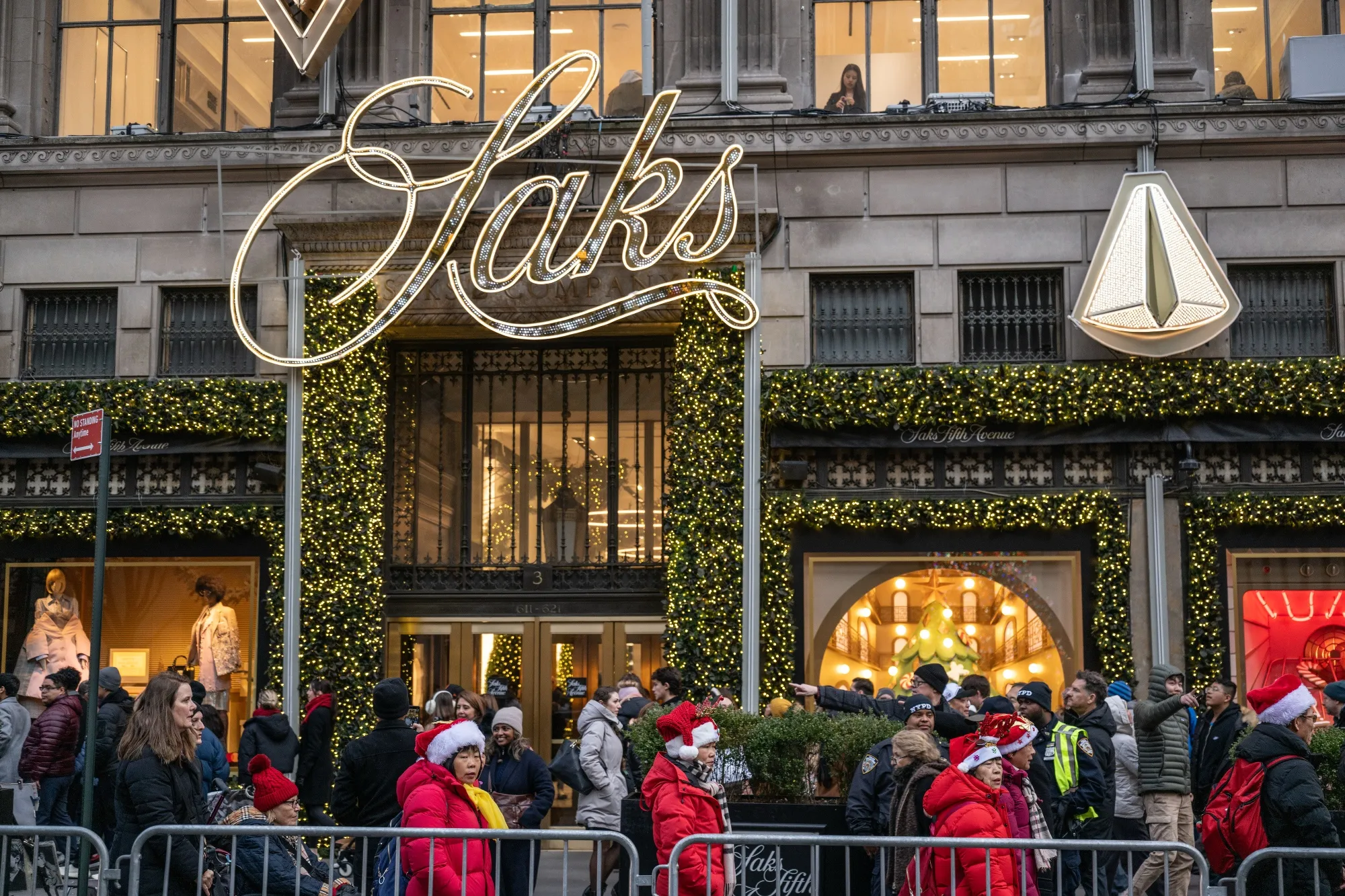 Shoppers outside a Saks Fifth Avenue store in New York.