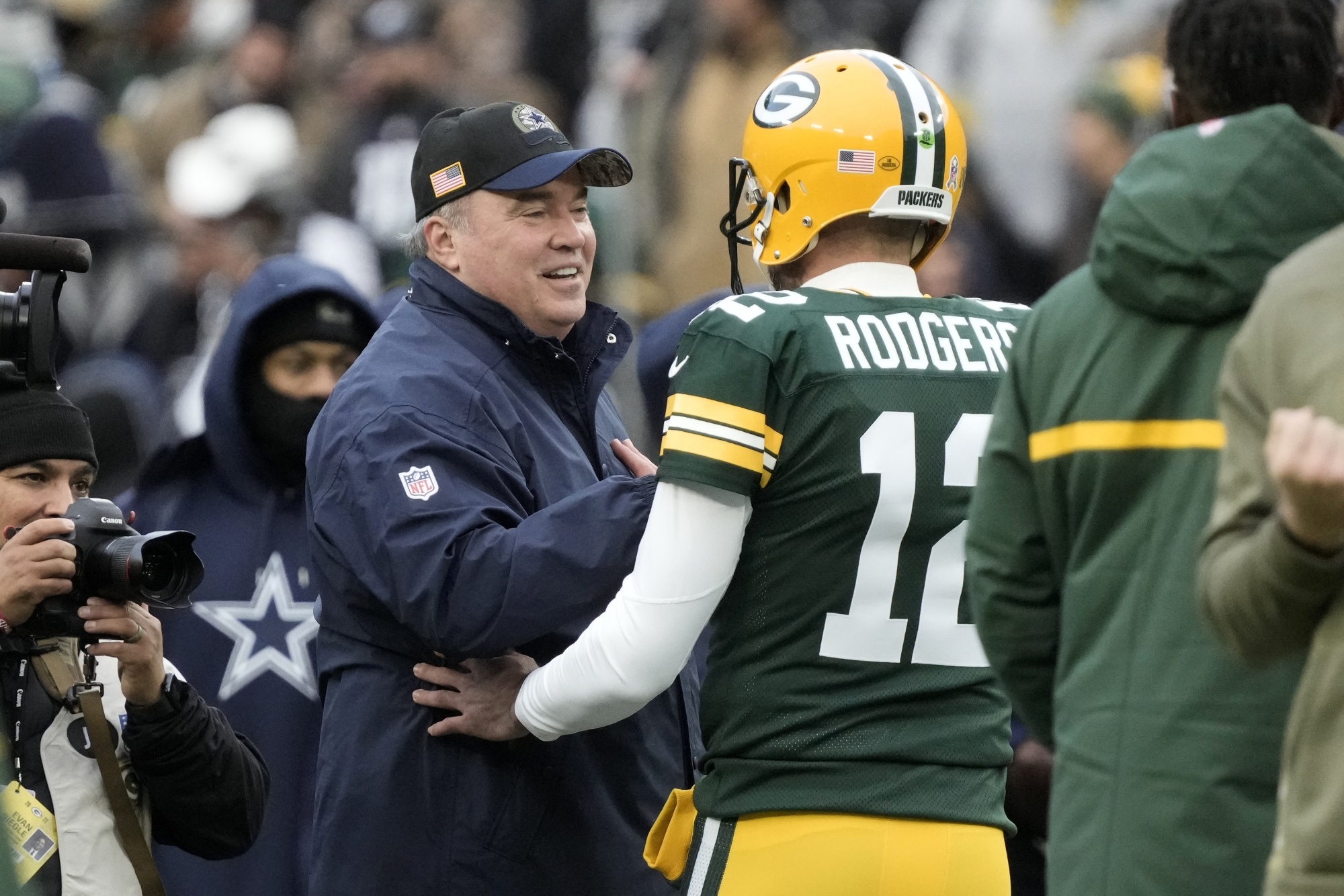 Green Bay Packers quarterback Aaron Rodgers (12) looks to pass the ball  against the Washington …