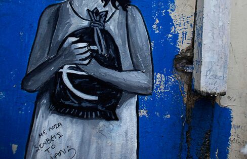 As world leaders struggle to keep Greece in the euro, artists are taking to the streets to express their own view of how the crisis should play out. Click image to see more.