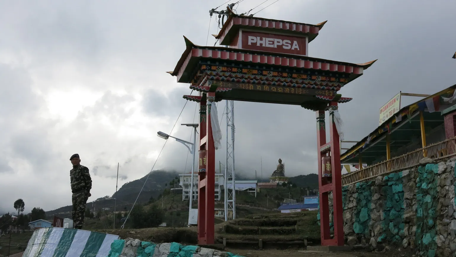 Soldier guards military installation in Tawang. This Indian town with its historic monastery is in the Indian state of Arunachal Pradesh, which has long been disputed territory and that China claims as 'South Tibet.'
