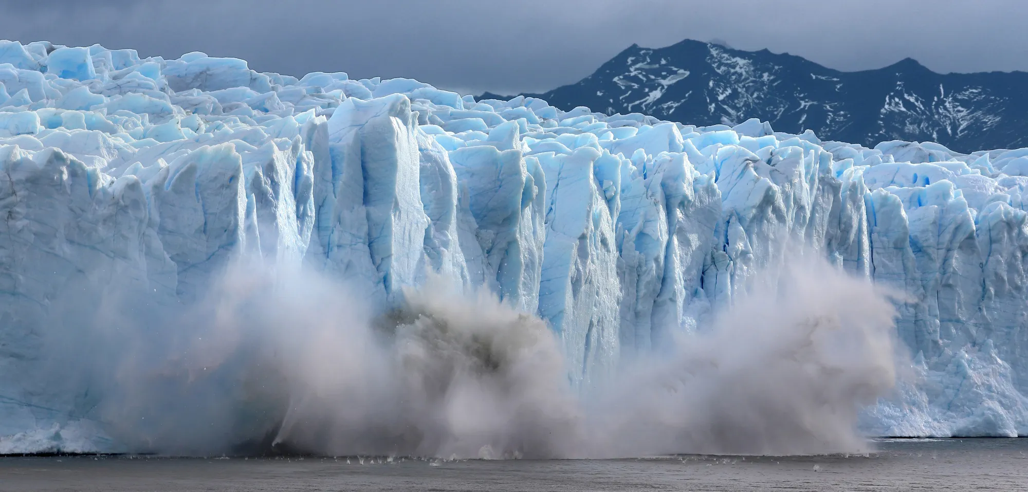 A piece of the Perito Moreno glacier breaks off and crashes into Lake Argentino.
