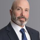 Headshot of Evan G Greenberg