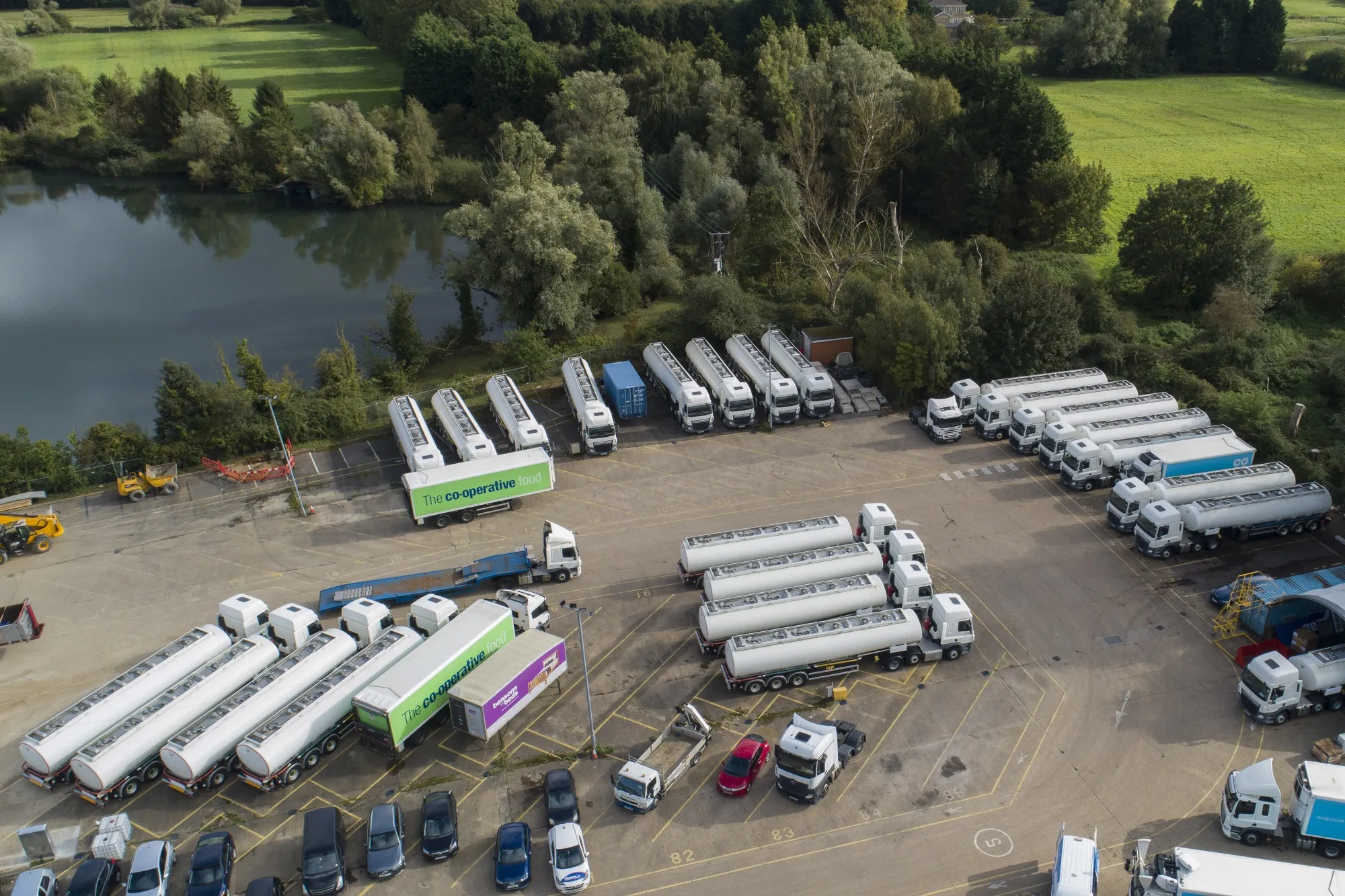 Fuel tankers from the U.K. government's emergency fleet at a depot in Fenstanton, U.K.