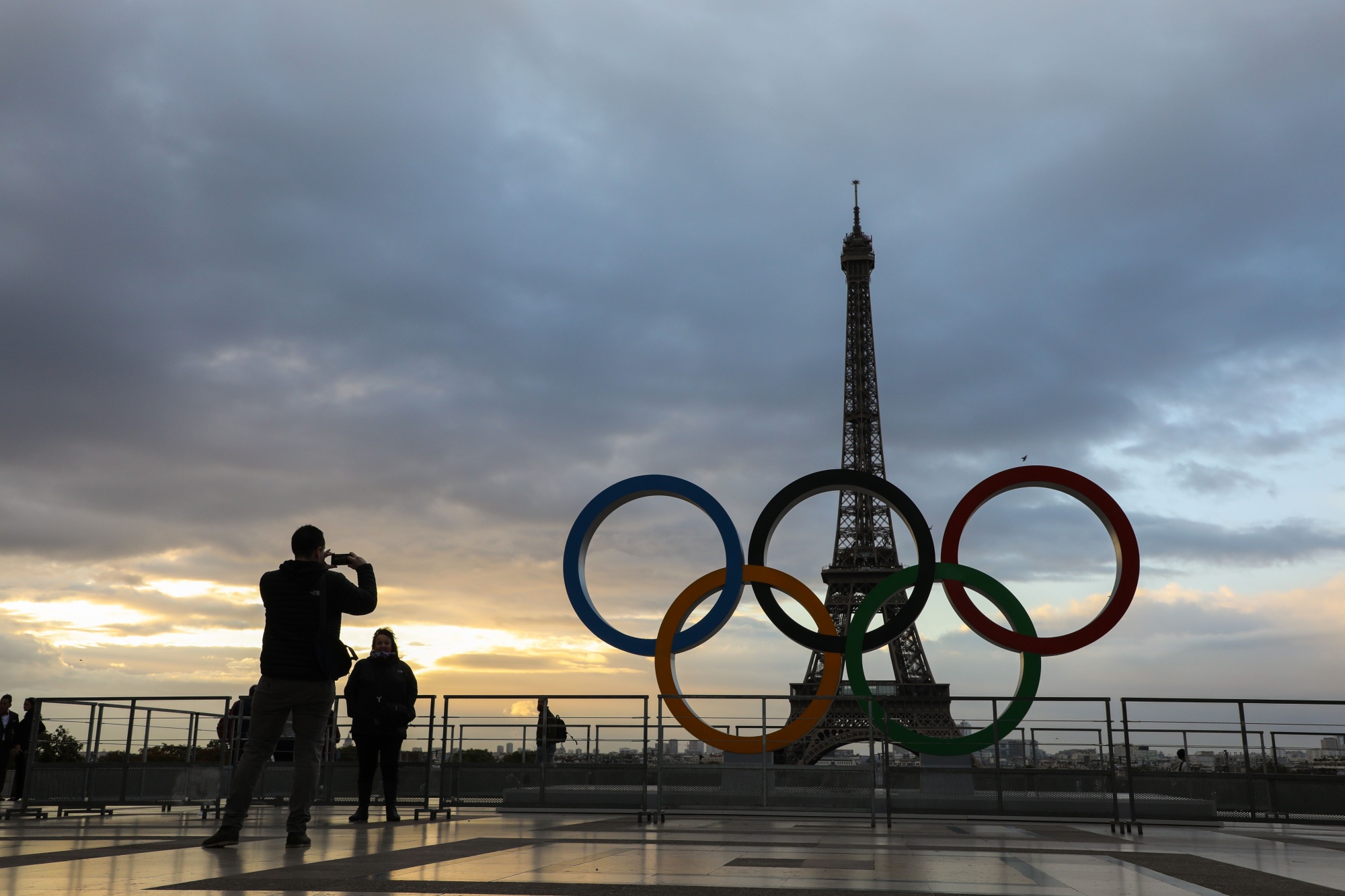 The Olympic rings near the Eiffel tower in Paris.