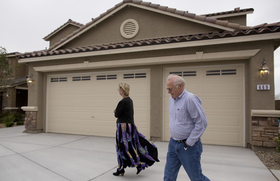 An elderly couple looks at a multigenerational model home in Las Vegas, Nevada. 