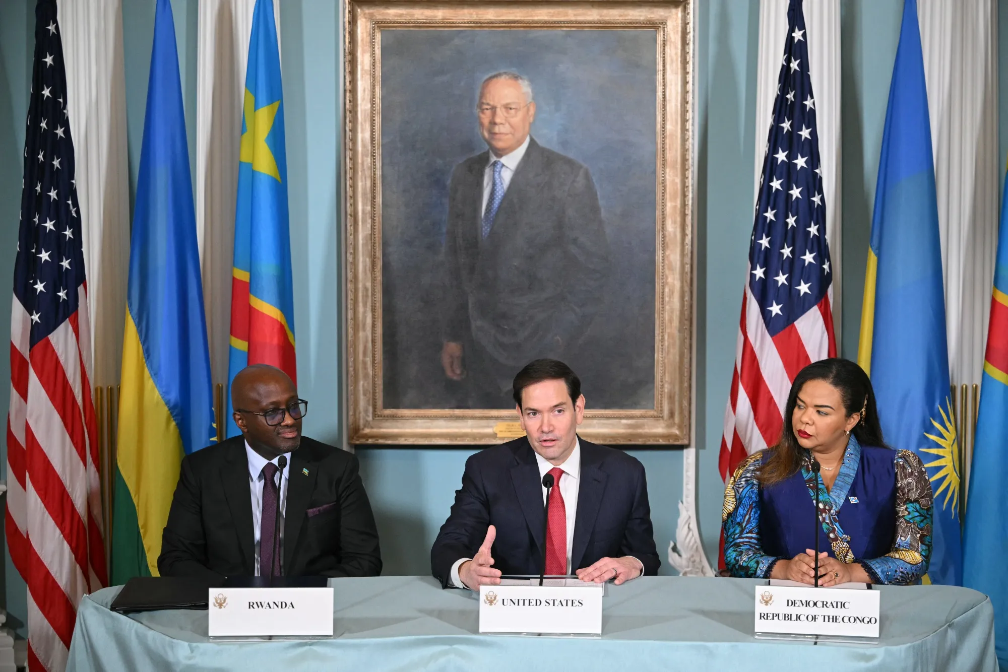 Rwandan Foreign Minister Olivier Nduhungirehe, from left, US Secretary of State Marco Rubio, and Democratic Republic of the Congo Foreign Minister Thérèse Kayikwamba Wagner during a peace agreement signing ceremony at the State Department in Washington.