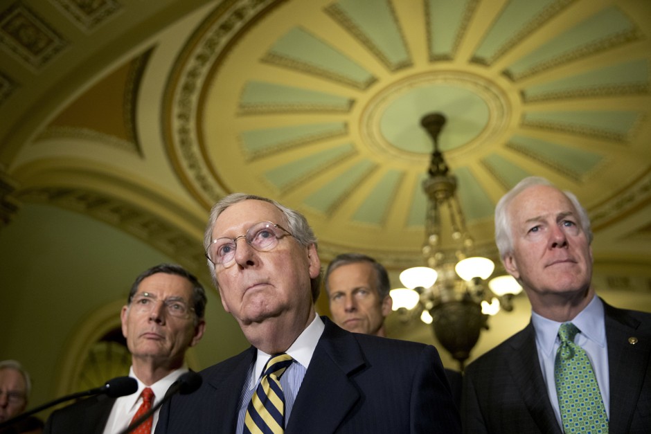 Senate Majority Leader Mitch McConnell, accompanied by, from left, Senator John Barrasso, Senator John Thune, and Senate Majority Whip John Cornyn. Republican leaders relented during budget negotiations on their efforts to block funding for Flint.