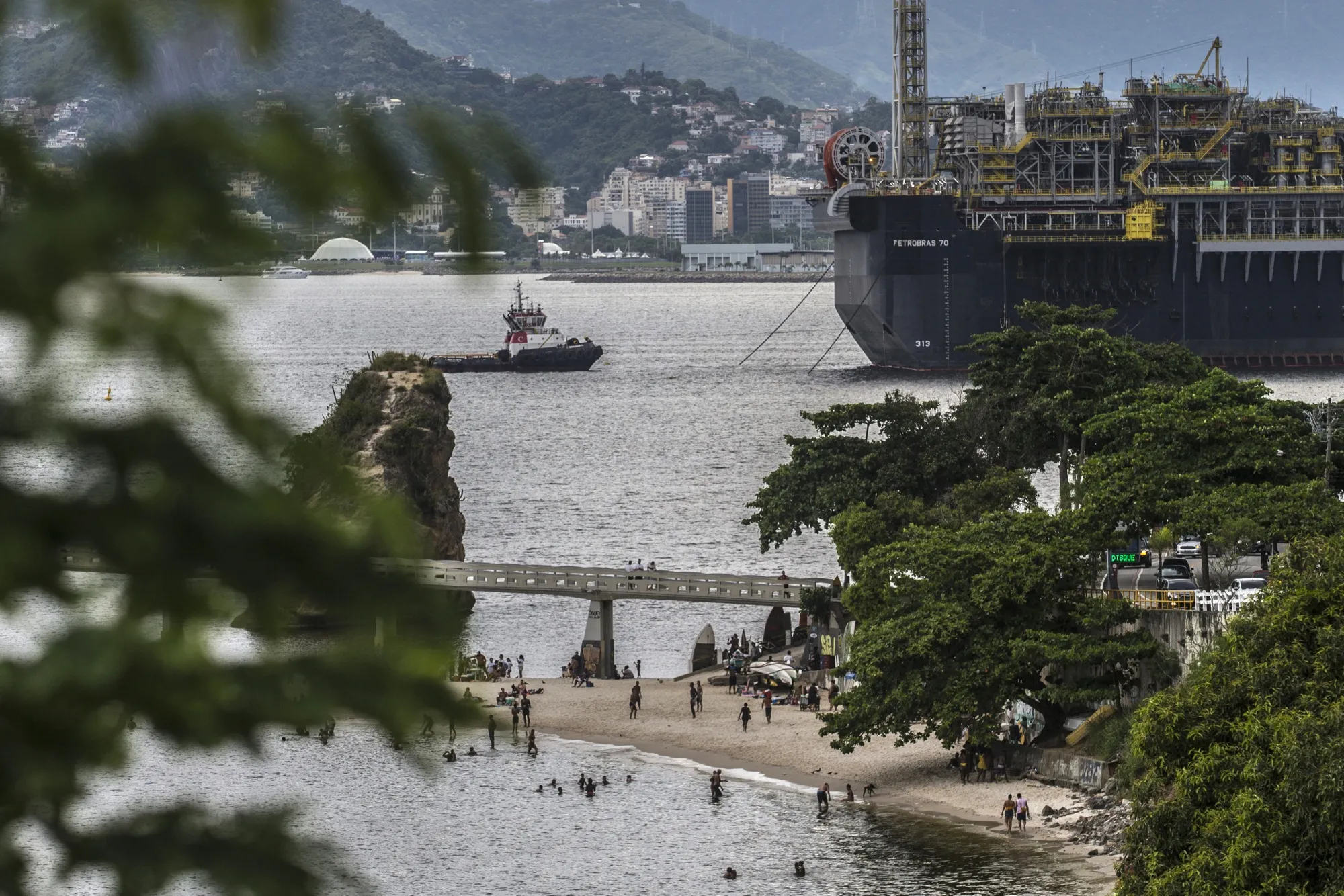 Petrobras’s&nbsp;P-70 production and storage vessel moves through the Guanabara Bay in the outskirts of Rio.